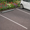 Butée de parking galvanisé Ø76mm sur une place de stationnement